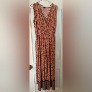 Gently worn sleeveless jumpsuit